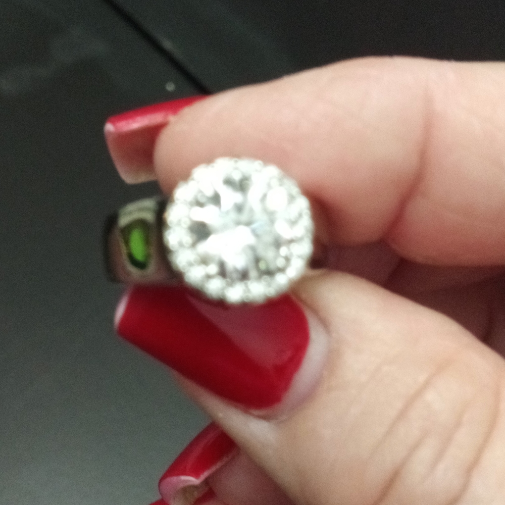Two carat center Stone halo around centerstone